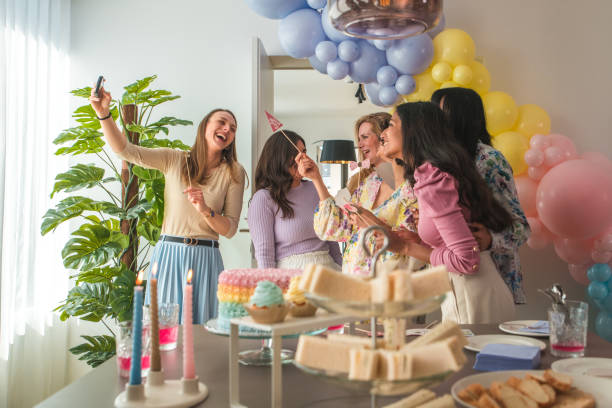 istock Selfie Celebration at Diverse Baby Shower Gathering 2003808853