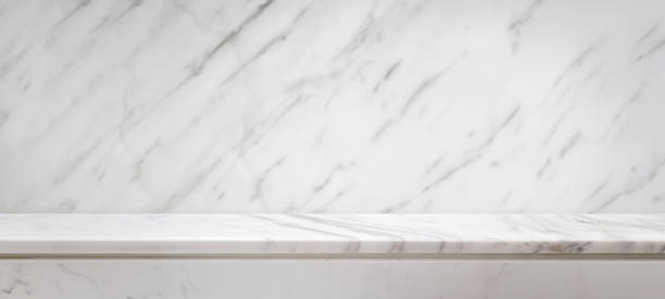 istock white marble table top with natural wall texture background for mockup product display template 2003809358