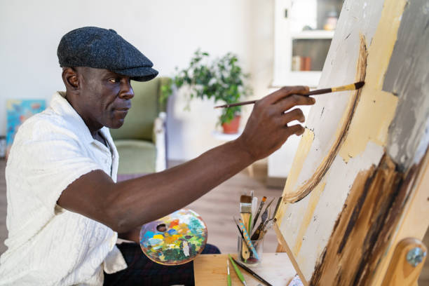 istock A man enjoying his talent for painting 2003812474
