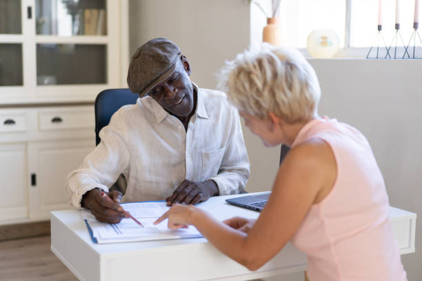 istock A finance manager is advising his female client 2003812481