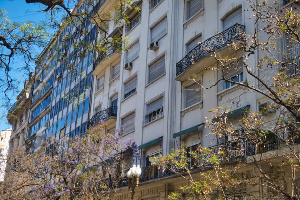 buenos aires, argentina - november 4 2022: exclusive apartments in residential building on a prestigious street with trees