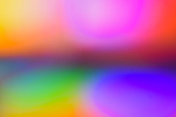 istock Holographic abstract background photo. Bright colourful gradient in pink, red, yellow, purple, blue and red with soft blur effect. Blurred hologram effect. 2003821816