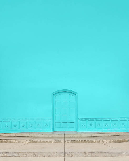 Minimal blue amphitheatre stage wall and door with copy space