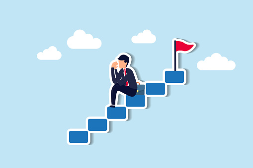 Fear of failure breeds anxiety, hindering career development, causing reluctance to progress, contributing to midlife crises concept, depressed businessman give up alone on stairway to success goal.