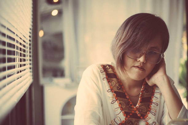 sad woman in white dress