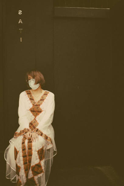 sad woman in white dress
