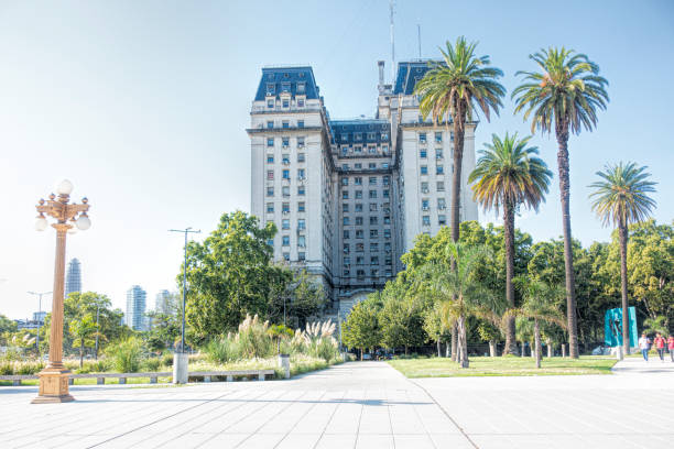 Elegant old buildings with European influence in Buenos Aires against a bright blue sky.
