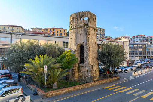 The medieval Ciapèla Tower, better known as Torre Saracena or Saracen Tower, at Piazza Eroi Sanremesi across from the La Pigna old town in Sanremo, Italy.