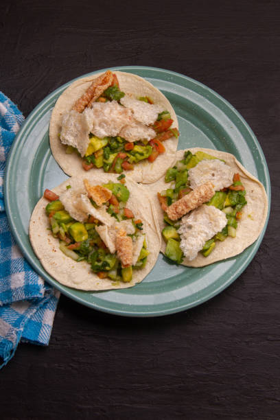 istock Mexican tacos Placeros with chicharron and guacamole. 2004171159
