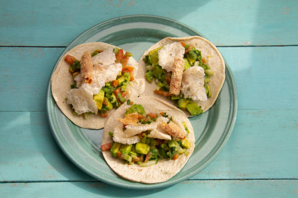 istock Mexican tacos Placeros with chicharron and guacamole. 2004171672