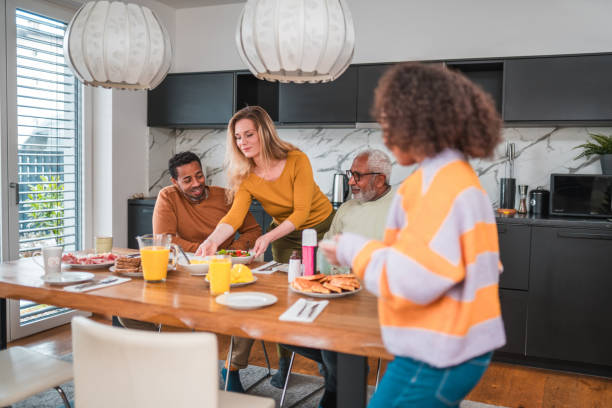 istock Diverse Family Enjoying Multigenerational Breakfast Together 2004192295