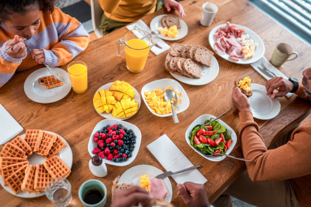 istock Diverse Family Enjoying Multigenerational Brunch Together 2004192311