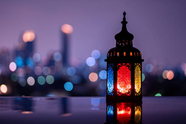 istock Lantern with night sky and city bokeh light background 2004197019