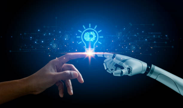 istock Hands of robot and human touching virtual AI brain data creative in light bulb. Innovation futuristic science and artificial intelligence digital technology global network connection. 2004198609