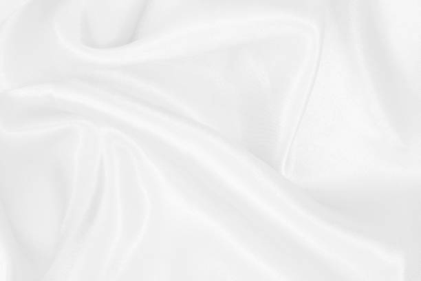istock White fabric texture background, detail of silk or linen pattern. 2004240581