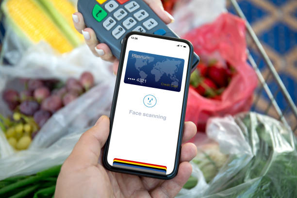 istock man payment purchase for phone and pay pass online terminal 2004274724