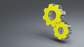 Working, solution, teamwork, processing concept. Gears - 3d glossy icon on gray background, copy space on the left side of the image.