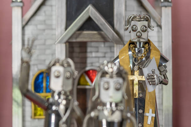 A priest at a wedding standing in front of a church (metal figure)