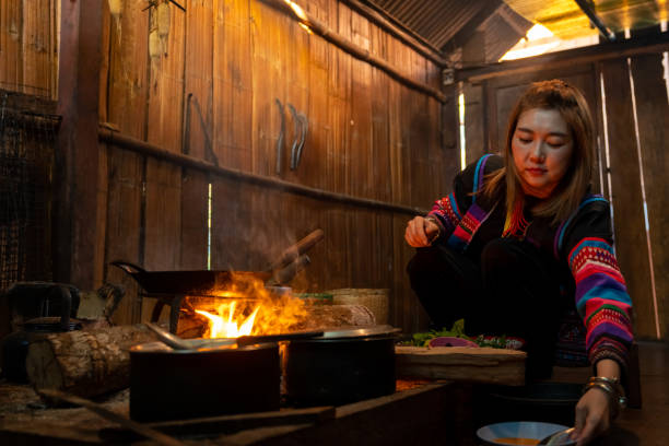 istock Hill tribes women cooking in traditional kitchen. 2004302224