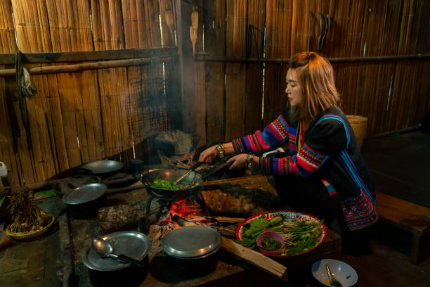 istock Hill tribes women cooking in traditional kitchen. 2004302234