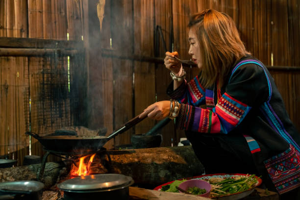 istock Hill tribes women cooking in traditional kitchen. 2004302235