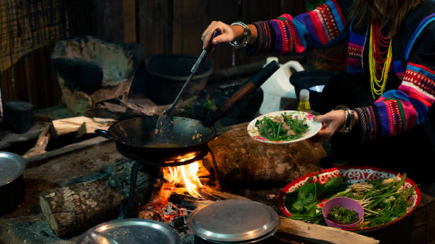 istock Hill tribes women cooking in traditional kitchen. 2004314251