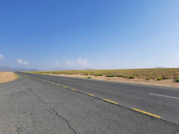istock car road in a quiet mountainous desert area 2004326290