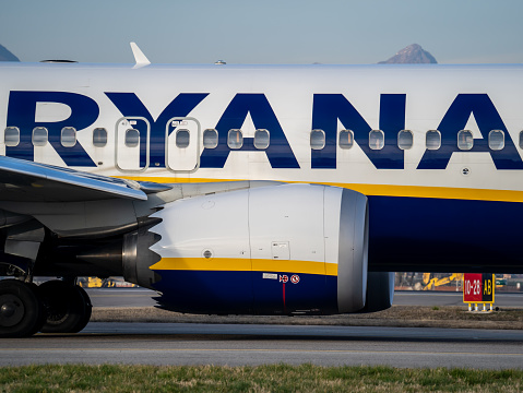 Ryanair Boeing 737 Max 8. Close-up to the engine of the passenger plane waiting for departure