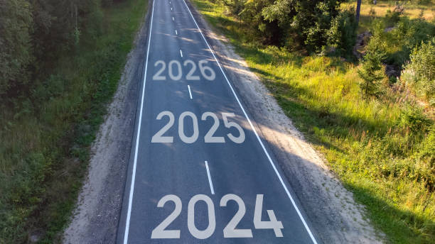istock 2024 2025 2026 Concept on road in forest 2004344596