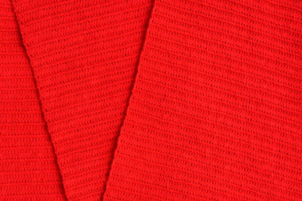 overlap of red wool knitted yarn texture, woolen fabric background