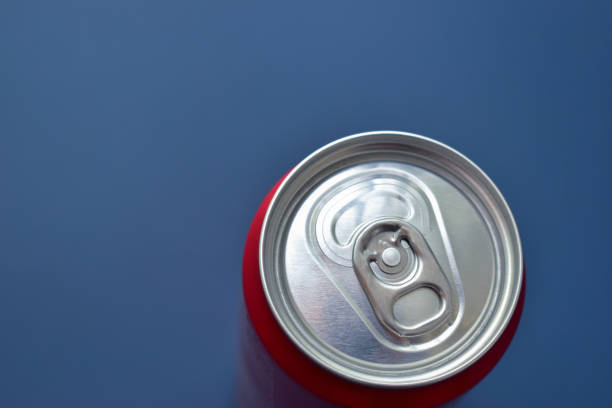 istock aluminium red cans soft drink put on blue texture background 2004429875