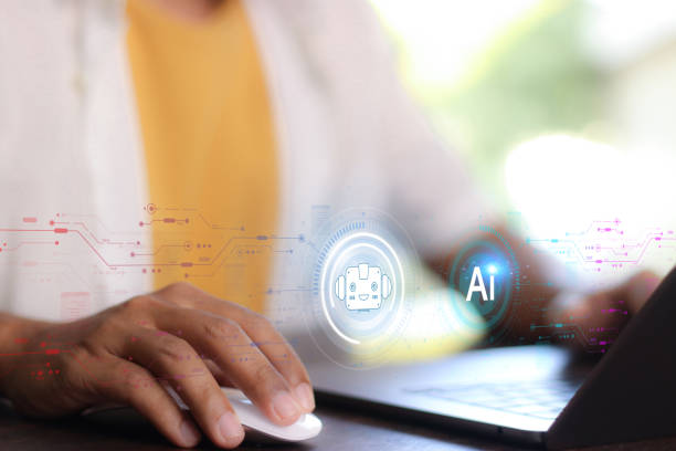 istock Chat with AI or Artificial Intelligence. Young businessman chatting with a smart AI or artificial intelligence using an artificial intelligence chatbot developed by OpenAI. 2004455255
