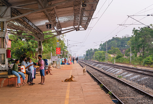 Gokarna, India - February 21, 2023 - People waiting for the train at the station.