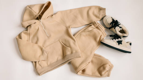istock Children's tracksuits on a white background, advertising 2004476340