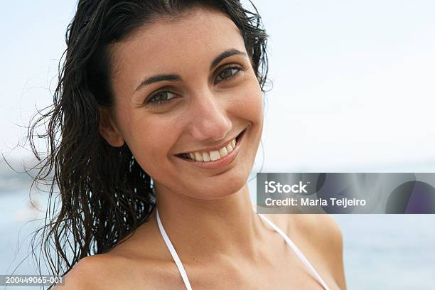 Young Woman On Beach Smiling Closeup Portrait Stock Photo - Download Image Now - 25-29 Years, Adults Only, Balearic Islands