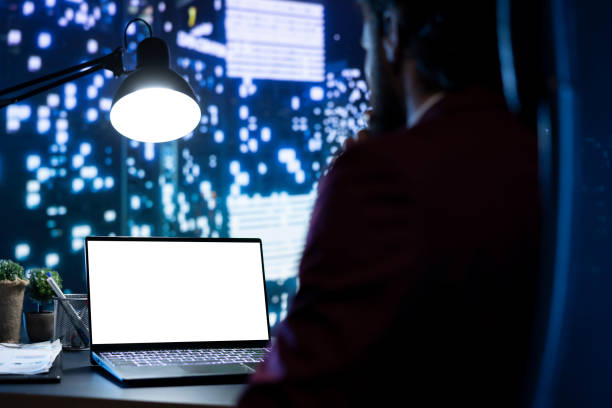 istock Legal investor works with white display on pc at posh workstation 2004503555