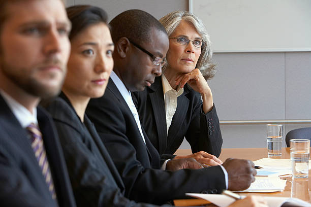 Business colleauges in meeting  corporate boardroom stock pictures, royalty-free photos & images