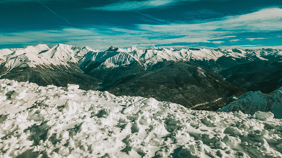 mountain peaks in the snow. Mountains and landscape covered with snow against the sky. Selective focus.