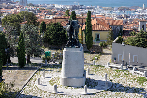 Trieste, Italy - September 26, 2023: Monument to the Fallen Soldiers of Trieste (Trieste War Memorial) located near Castle of San Giusto next to Remembrance Park