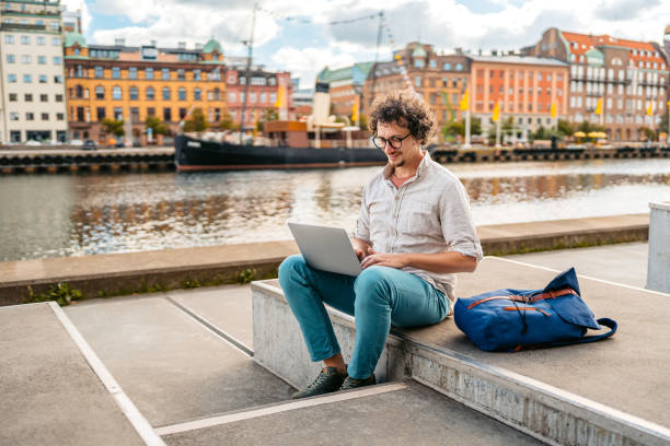 istock Young Man Working On Laptop On The Quayside In Malmo In Sweden 2004564850