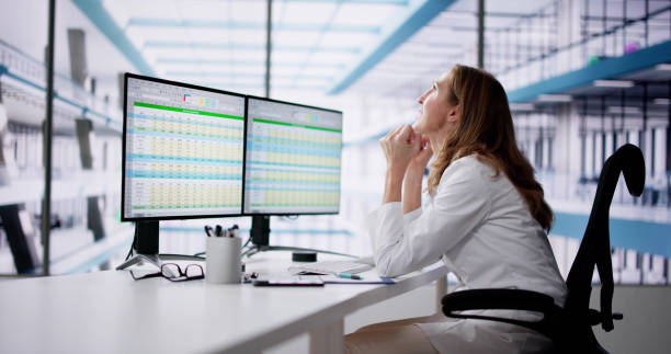 istock Unhappy Medical Doctor Doing Spreadsheet Codes 2004573468