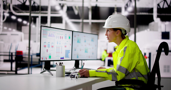 Engineer Operator Using SCADA System At Industrial Plant