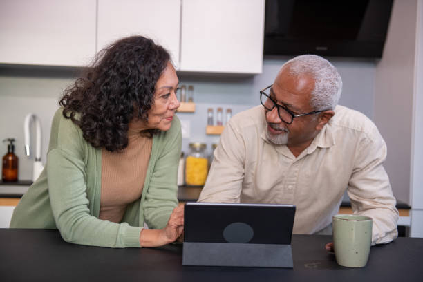 istock Senior couple having video call 2004629736