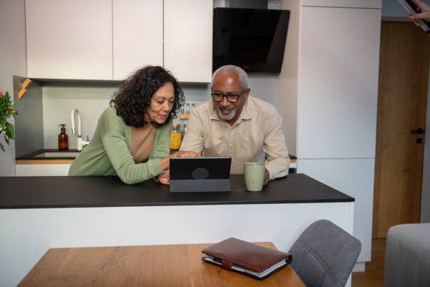 istock Senior couple having video call 2004631447