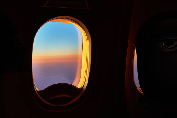 istock Sunset view from window of aricraft 2004646323