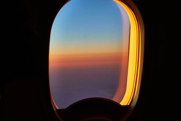 istock Sunset view from window of aricraft 2004646324