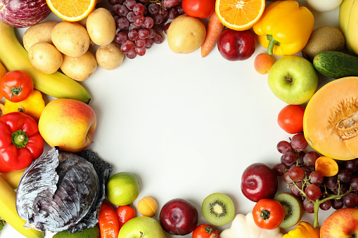 Set of different vegetables and fruits on white background