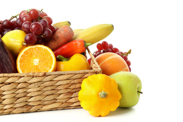 istock Basket with vegetables and fruits isolated on white background 2004655471