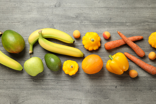 Fruit flat lay from above colorful food background