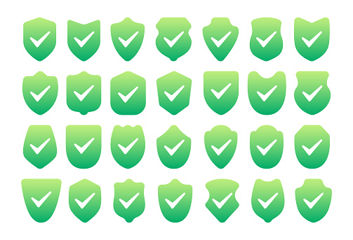 Collection of green shield shapes with checkmarks, representing safety, security, and verification.